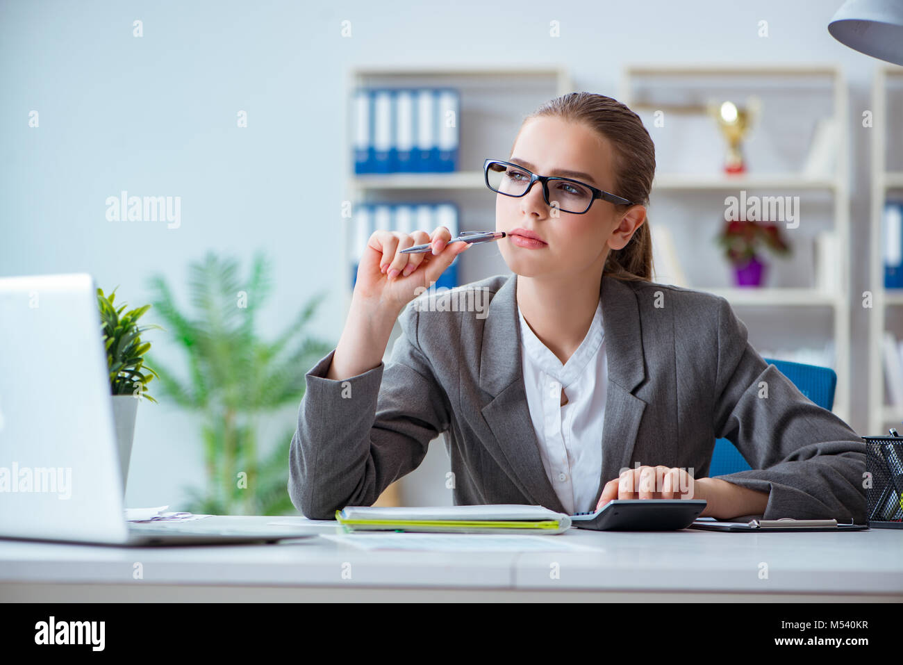 Young businesswoman accountant working in the office Stock Photo - Alamy