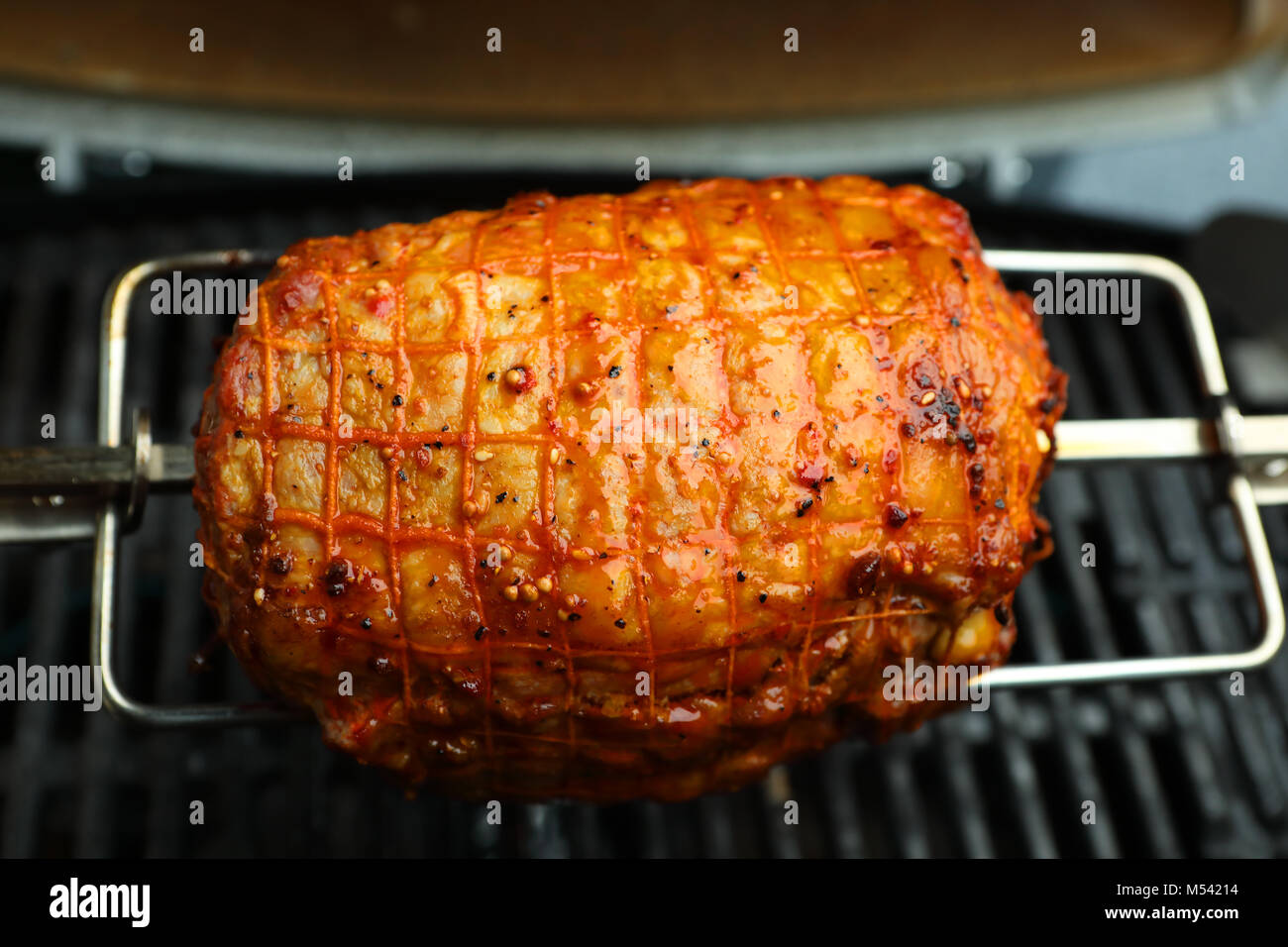 a roll roast on a spit Stock Photo