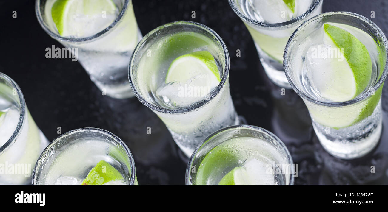 Cocktail. Vodka, gin, tequila with lime Stock Photo Alamy