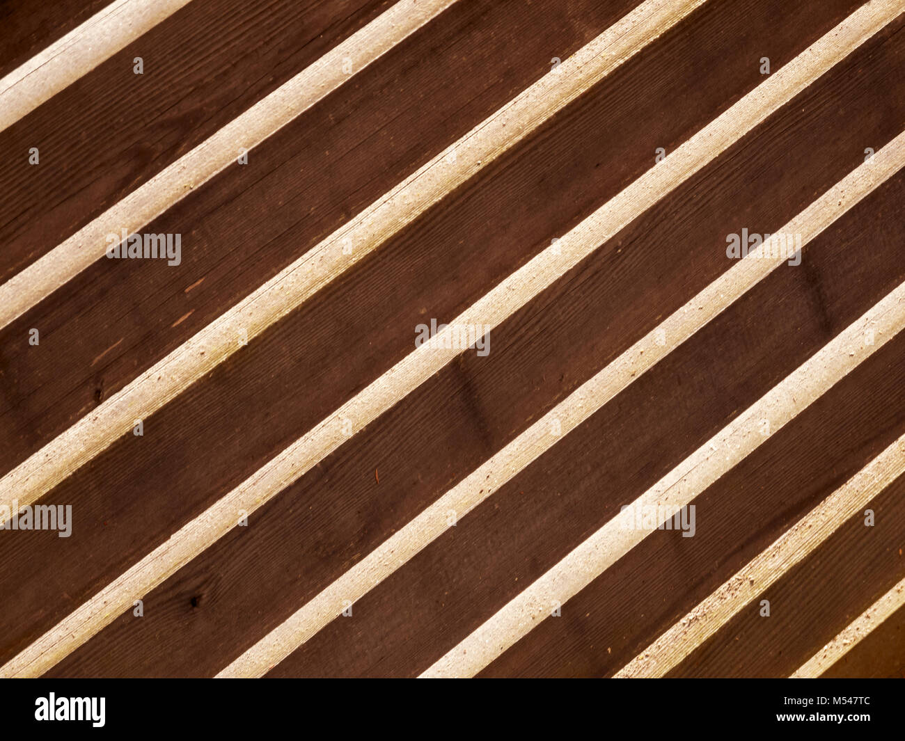 Diagonal boards with light incidence Stock Photo