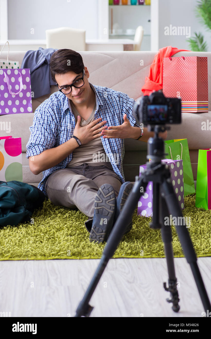 Male fashion blogger recording video for vlog Stock Photo - Alamy