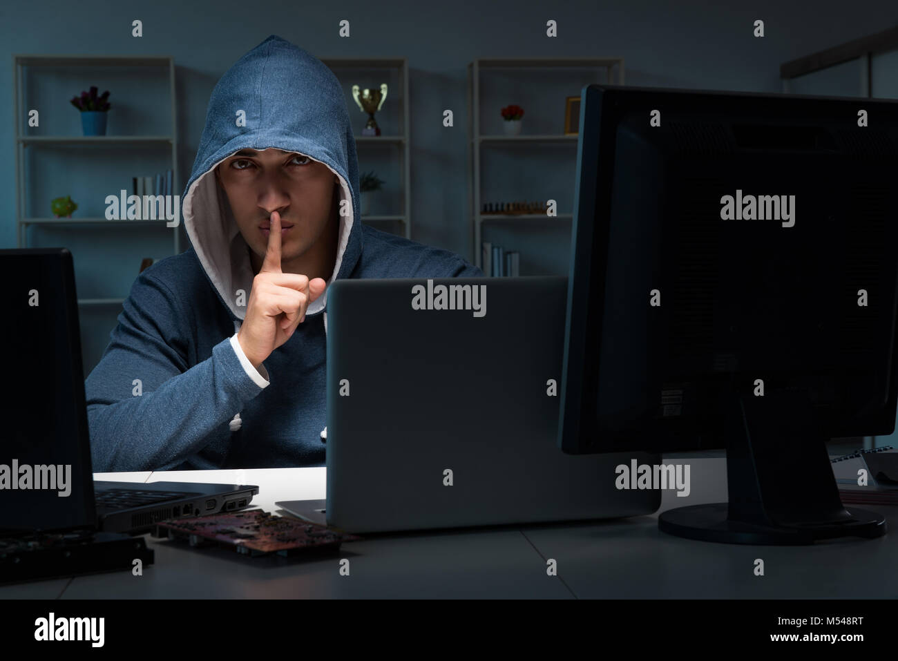 Hacker Switching Off A Computer Hacker hacking computer at night Stock Photo - Alamy