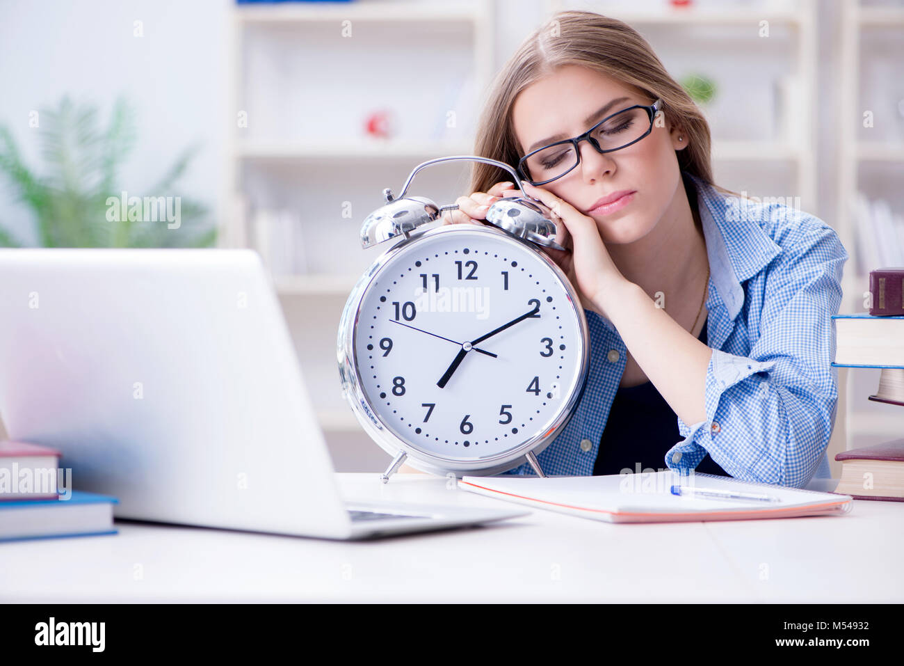 Young teenage female student preparing for exams at home Stock Photo ...