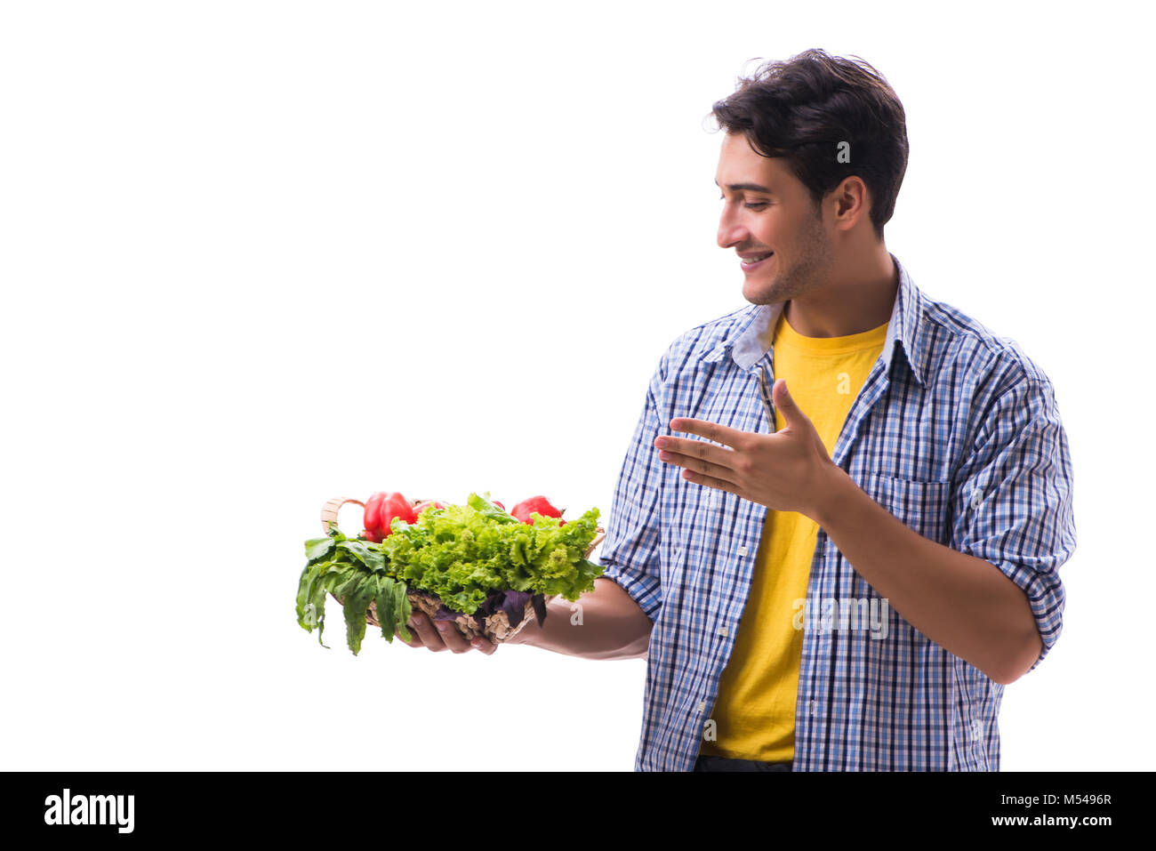 Man with basket of fruits and vegetables Stock Photo - Alamy