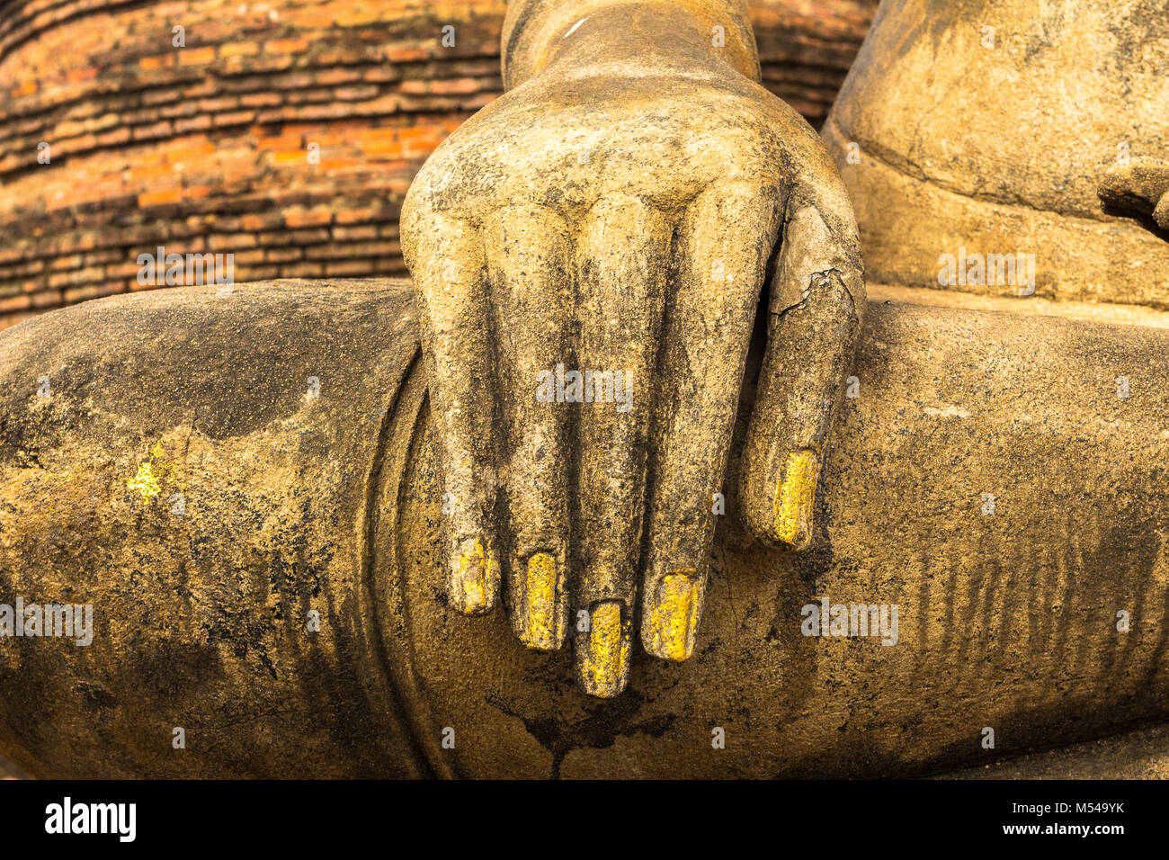 hand close up of sitting buddha sukhothai thailand Stock Photo