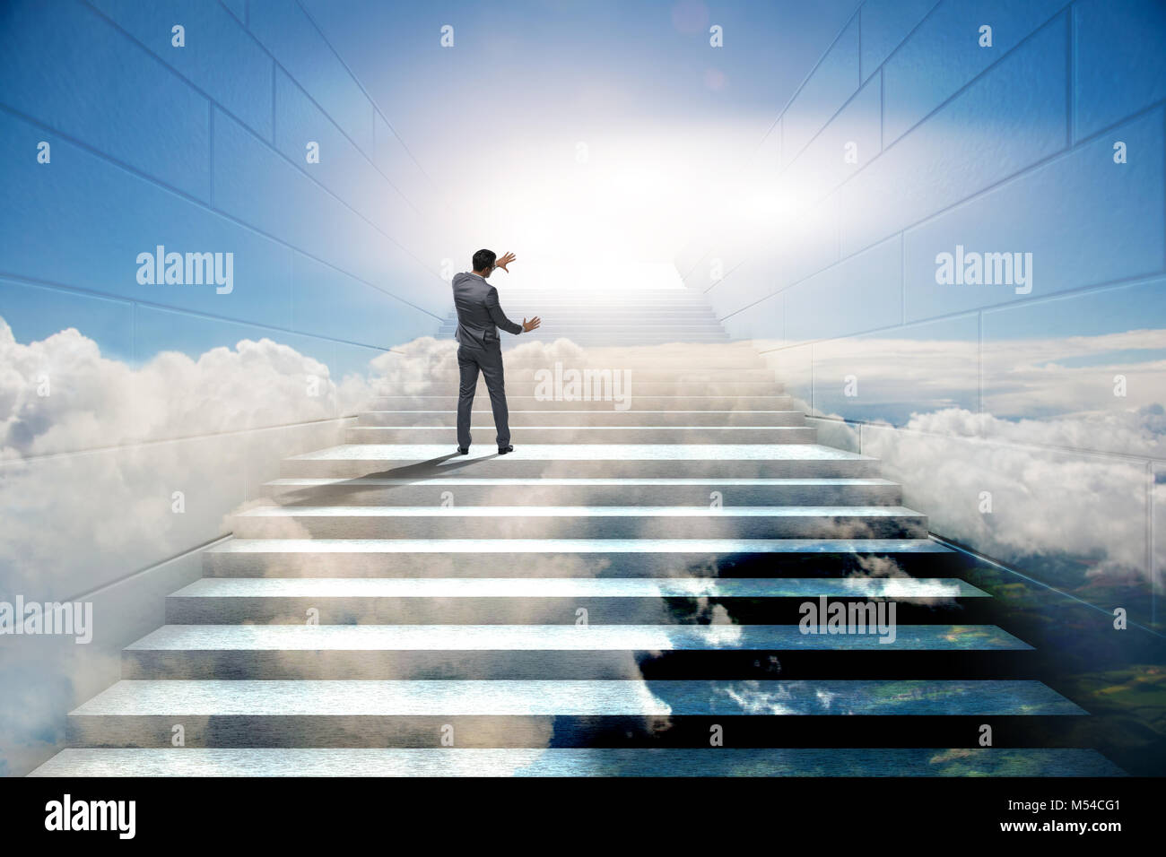Businessman climbing up challenging career ladder in business co Stock ...