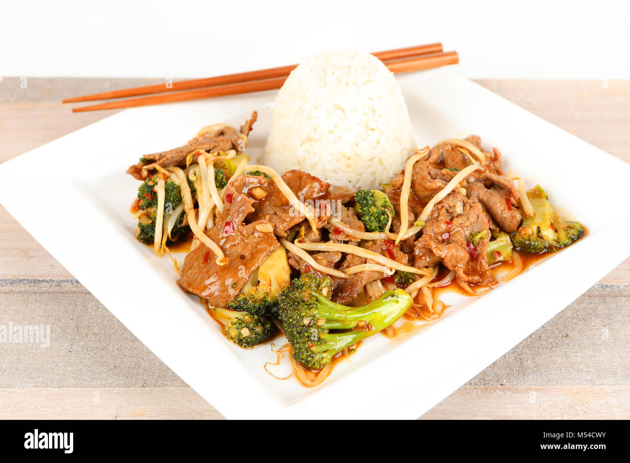 asian beef with broccoli and rice Stock Photo