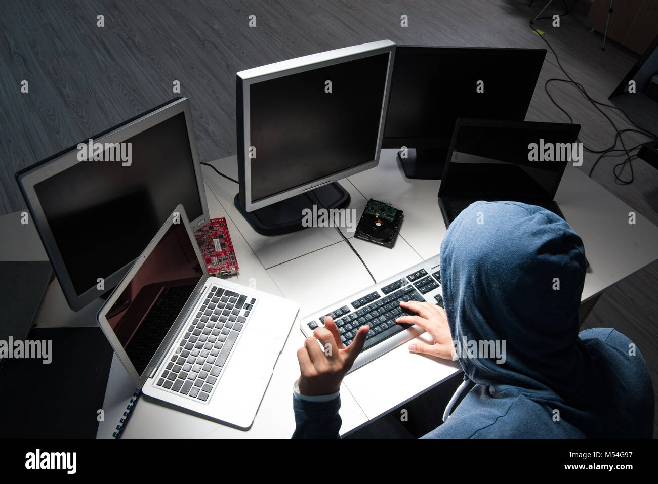 Hacker hacking computer at night Stock Photo - Alamy
