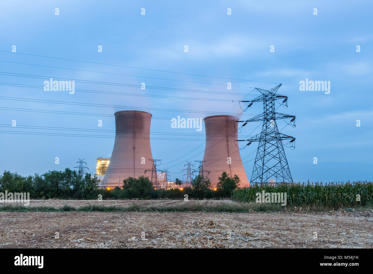 cooling water tower in nightfall Stock Photo