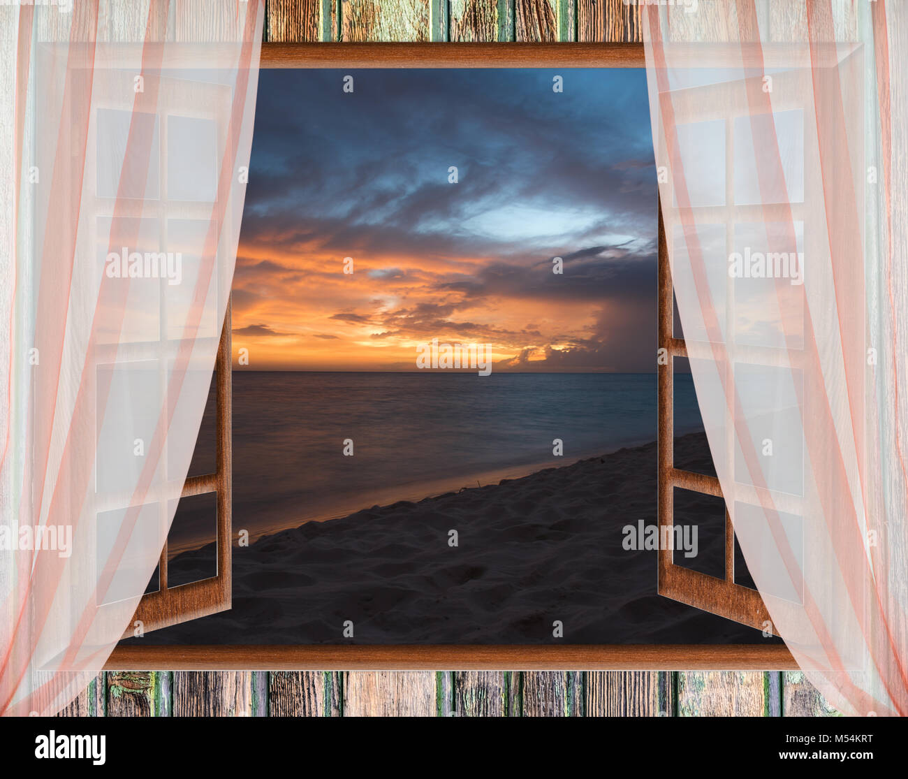 view from the open window of the caribbean sunset Stock Photo - Alamy