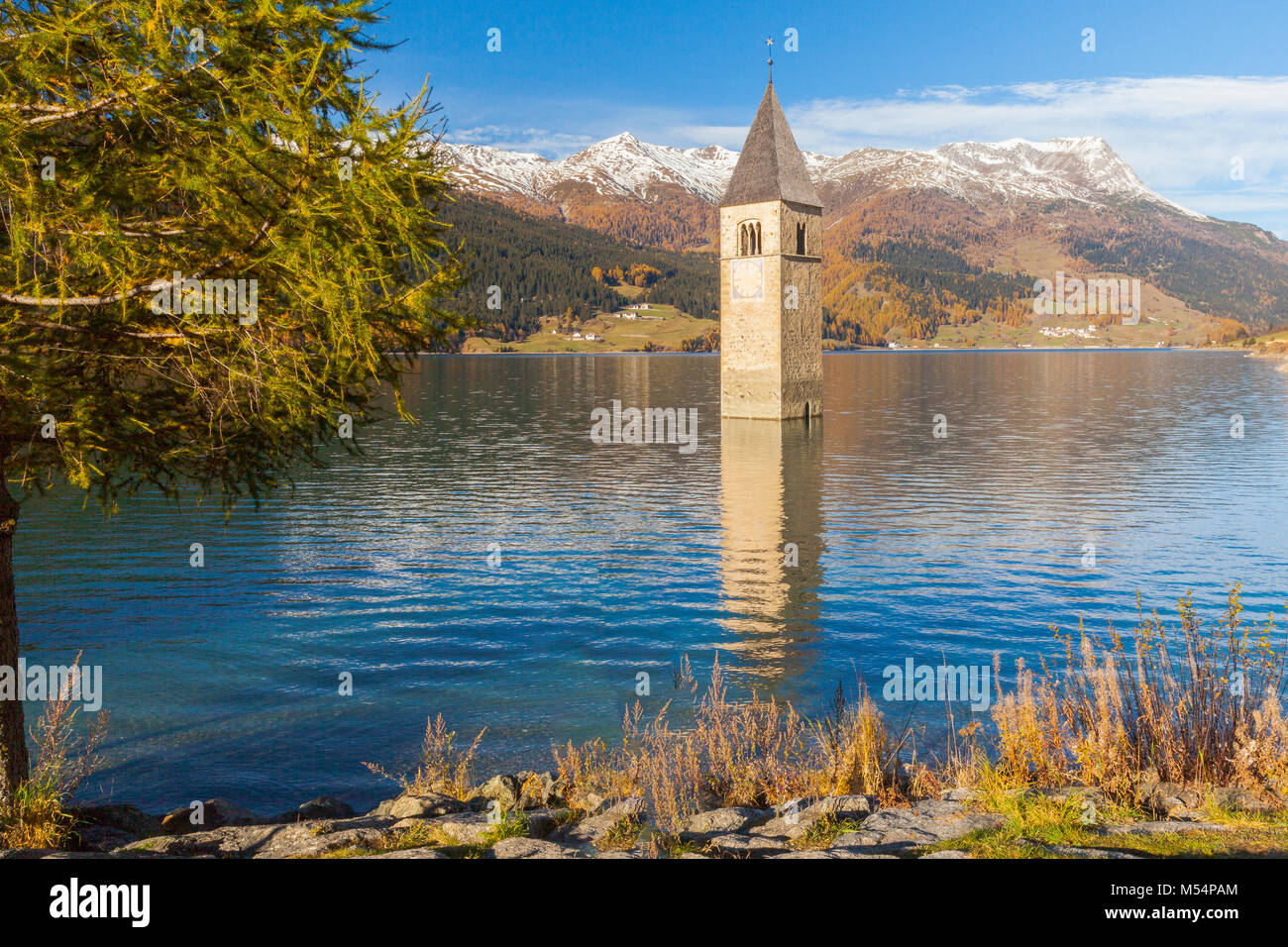 Submerged bell tower in lake resia Italian alps Stock Photo