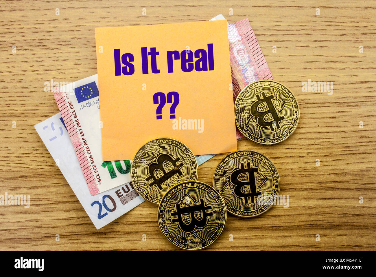 Bitcoin real metal coin is on one hundred dollars bills or banknotes. It  means hot price or value and high exchange rate of crypto currency on  market Stock Photo - Alamy