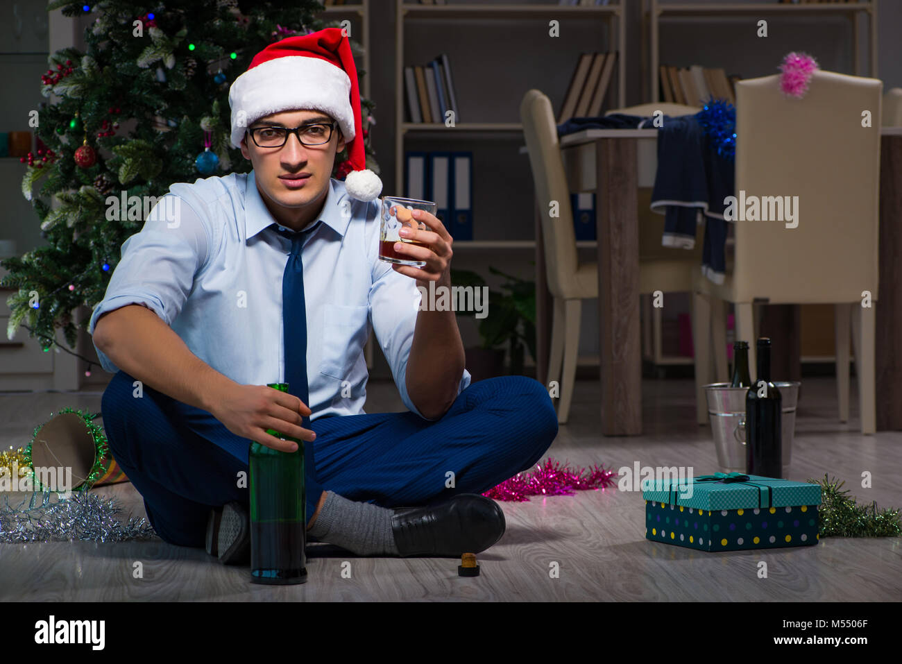 the-businessman-celebrating-christmas-at-home-alone-stock-photo-alamy