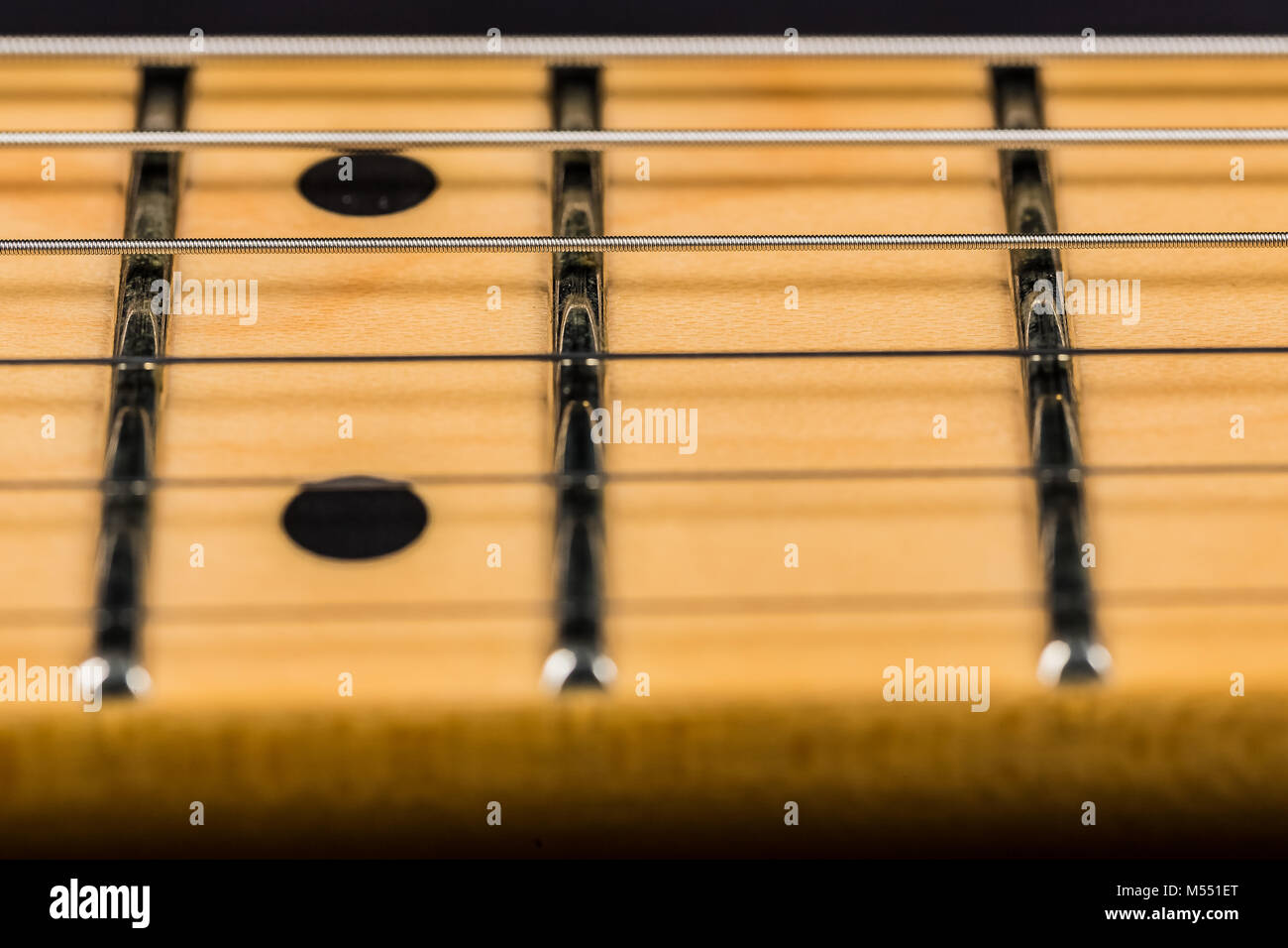 Selective focus close up of an Electric Guitar fretboard and strings Stock Photo Alamy