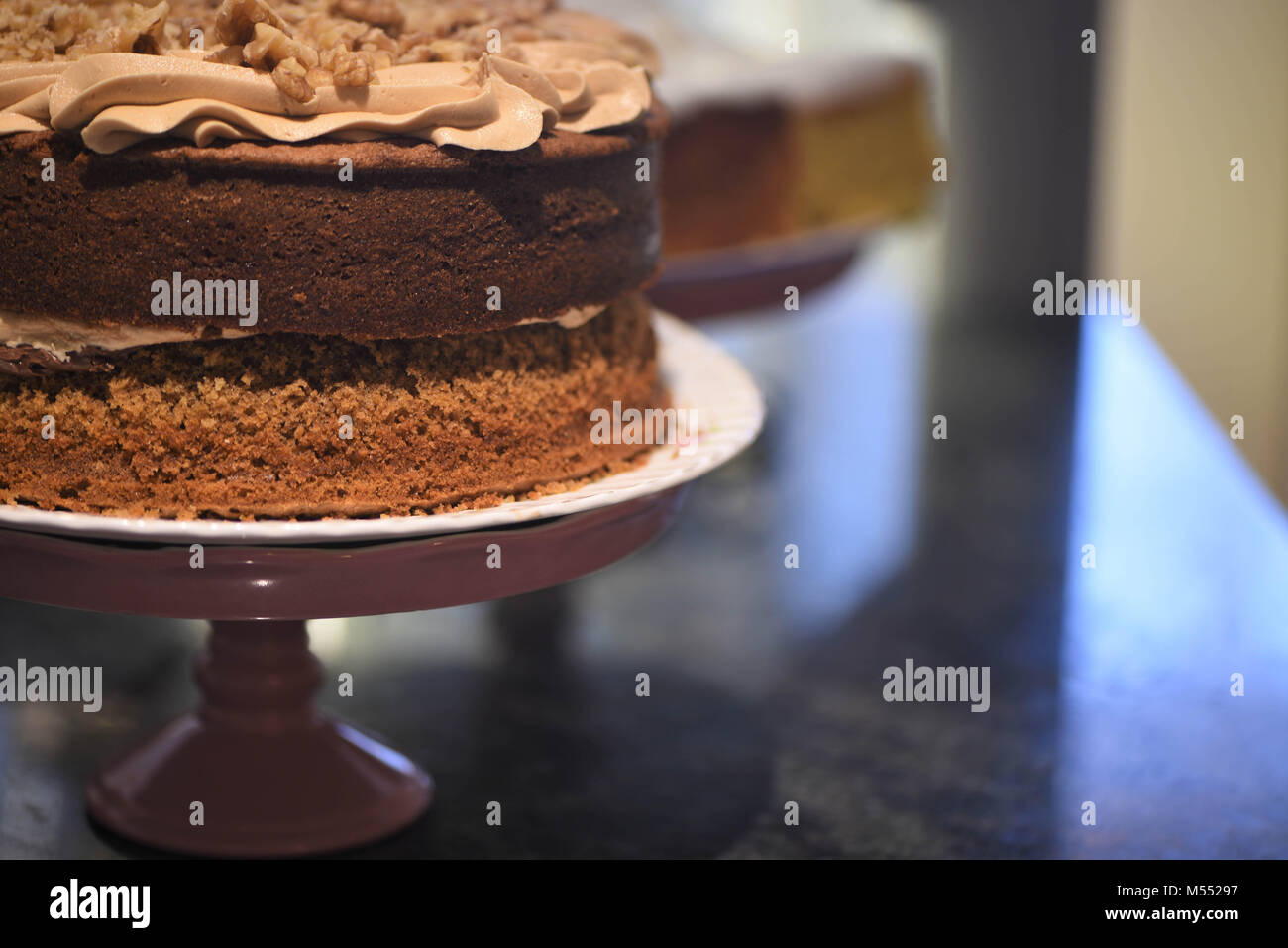 food close up of a baked coffee and pecan cake Stock Photo