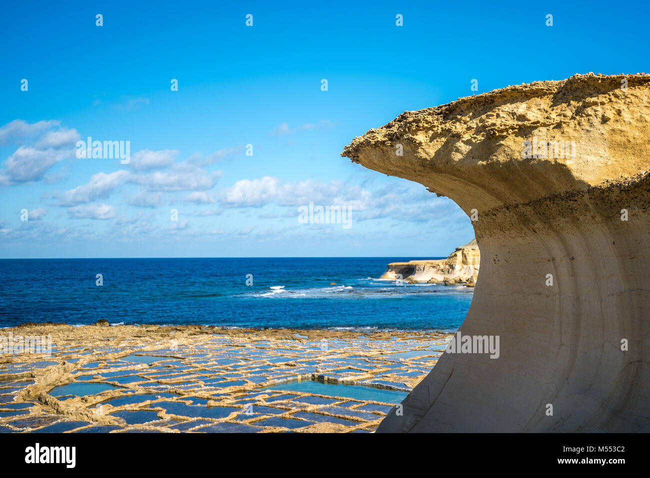 Salt evaporation ponds on Gozo island, Malta Stock Photo