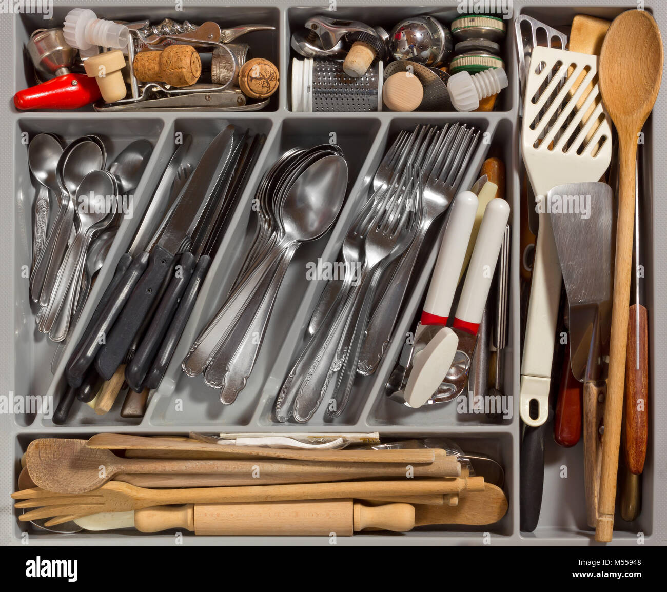 Contents of a kitchen drawer full of cutlery and utensils Stock Photo Alamy