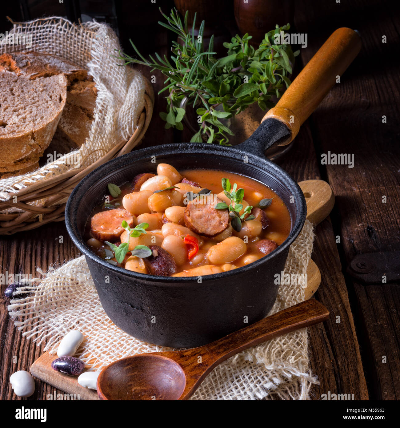 Polish Baked Beans with sausage Stock Photo Alamy
