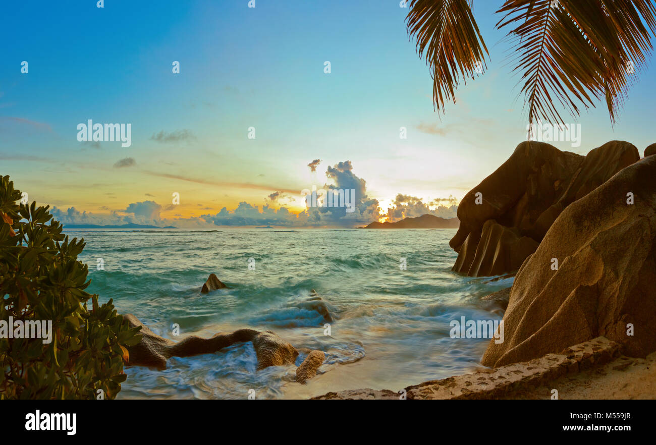 Evening sunset beach anse source hi-res stock photography and images ...