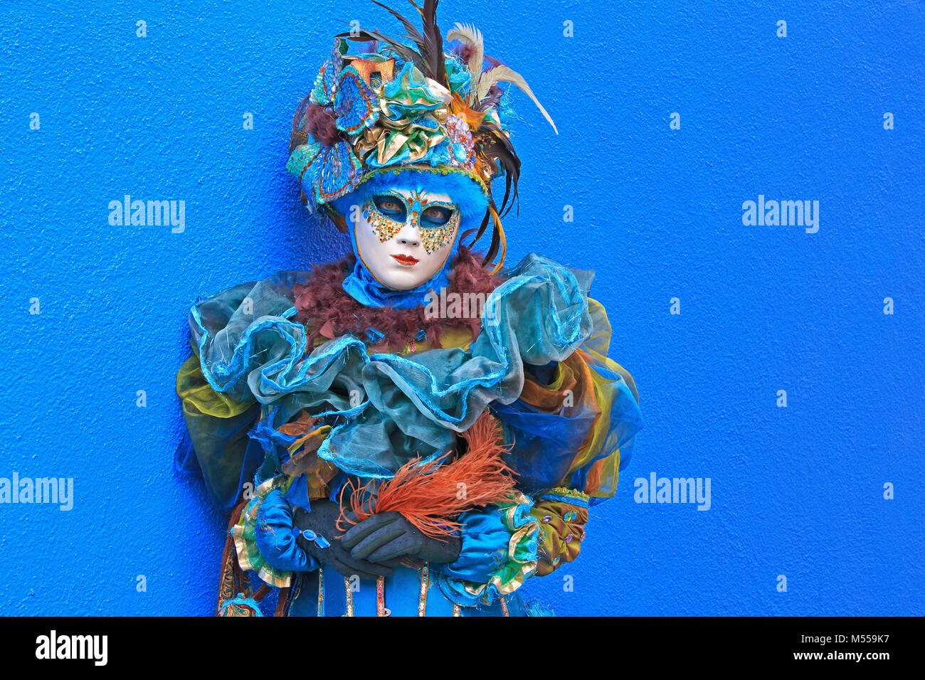 A costumed girl during the Carnevale di Venezia in Burano (Venice), Italy Stock Photo