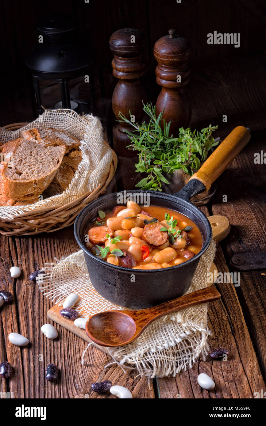 Polish Baked Beans with sausage Stock Photo Alamy