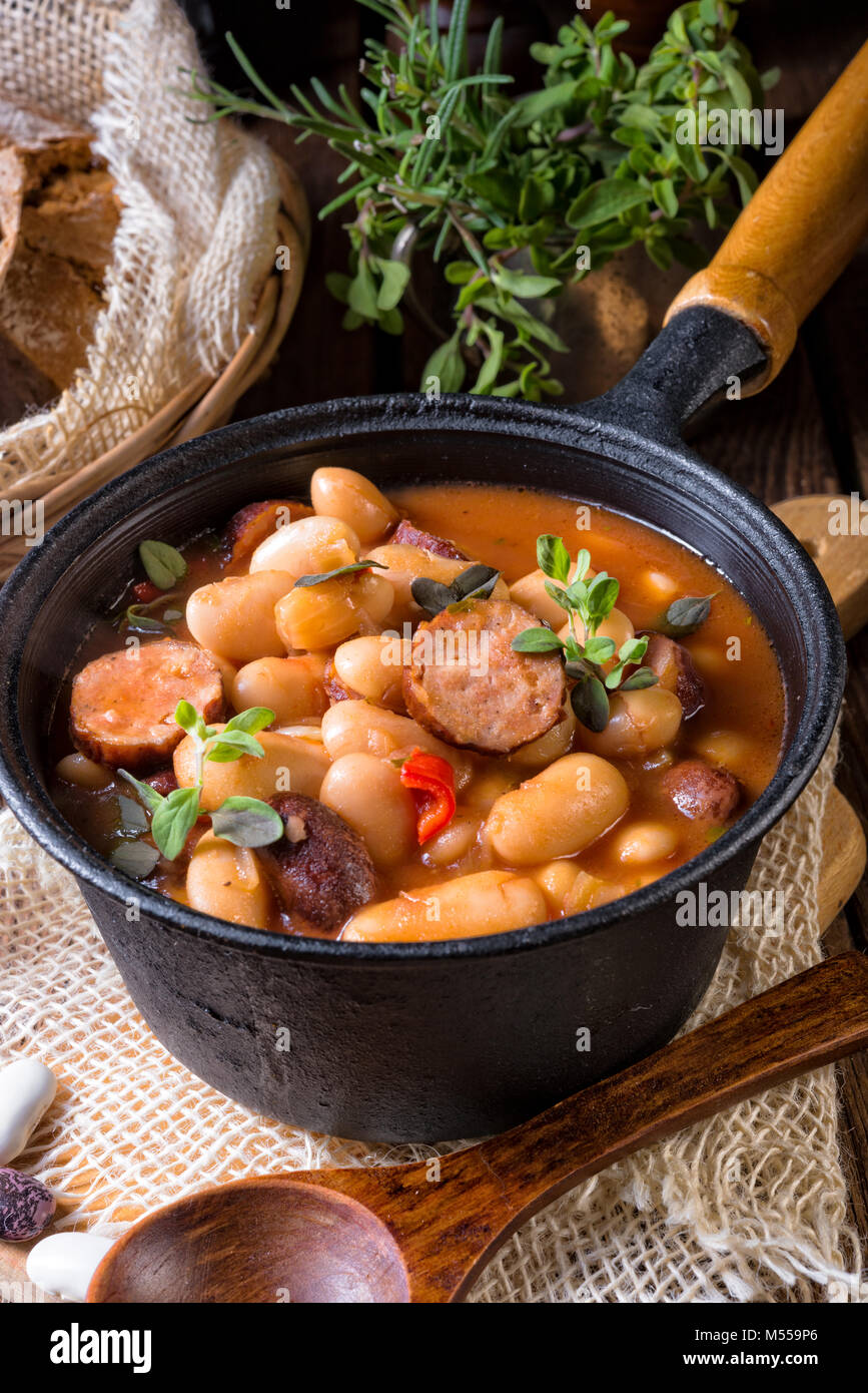 Polish Baked Beans with sausage Stock Photo Alamy