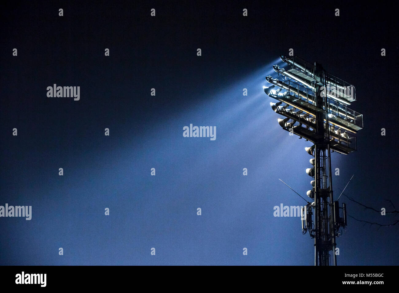 Big spotlights lighting tower at an sport arena stadium Stock Photo Alamy