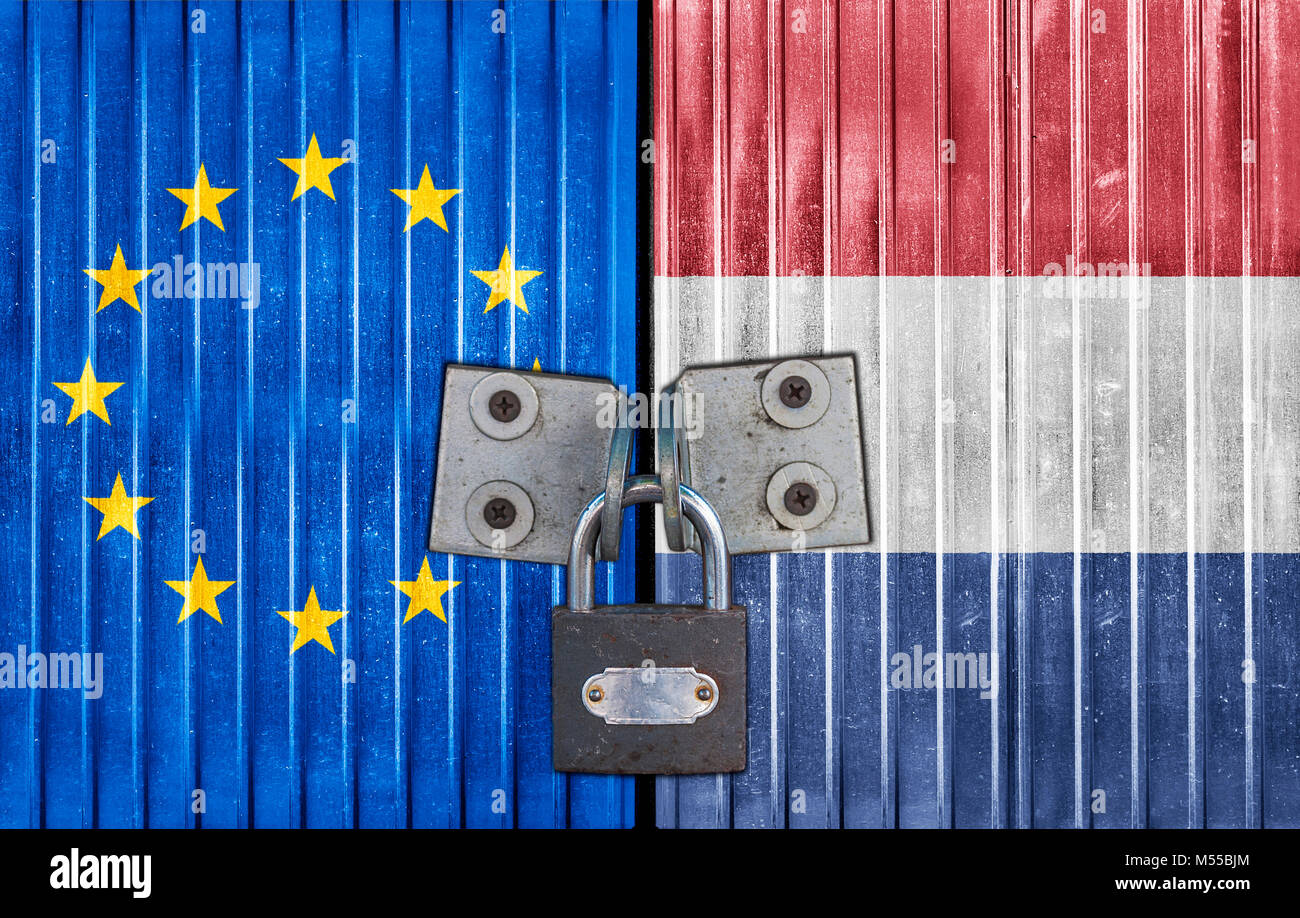 EU and Netherlands flag on door with padlock Stock Photo