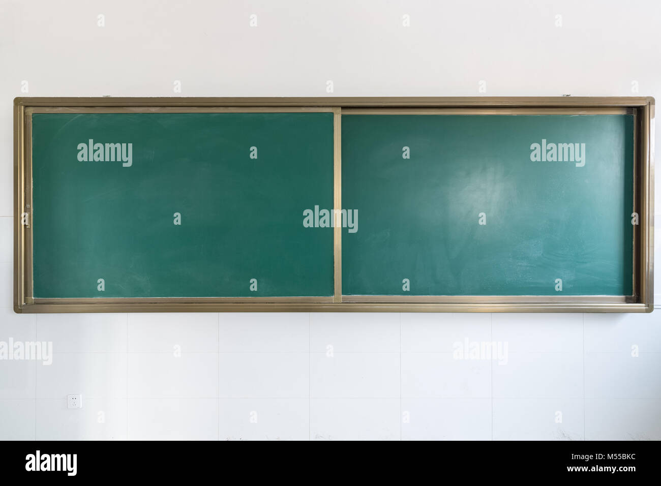 green chalkboard in classroom Stock Photo