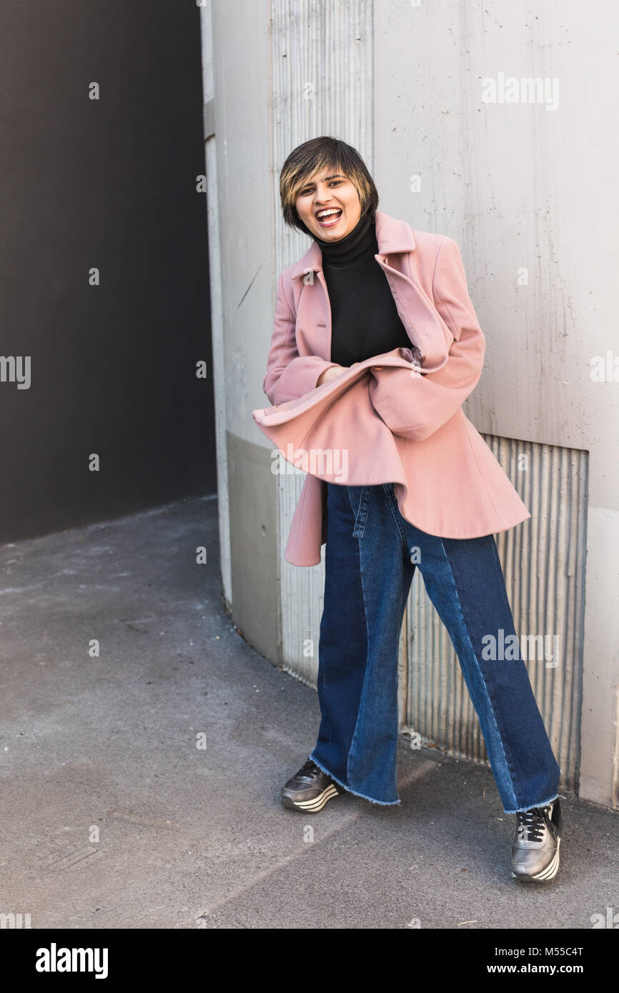 Beautiful young Indian woman posing in an urban context. Street fashion ...