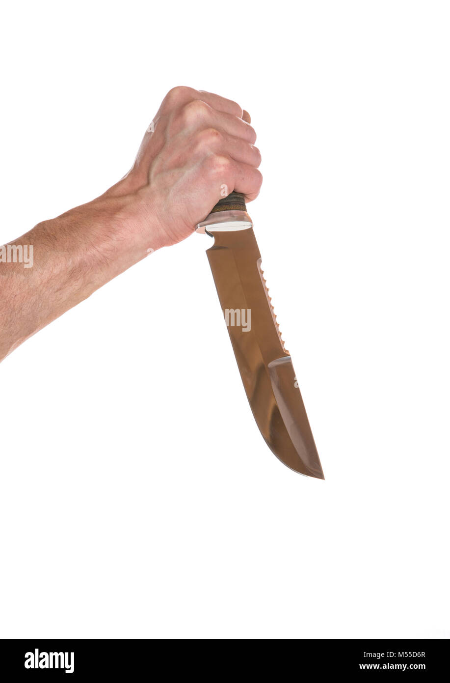 man's hand holds a hunting knife isolated Stock Photo
