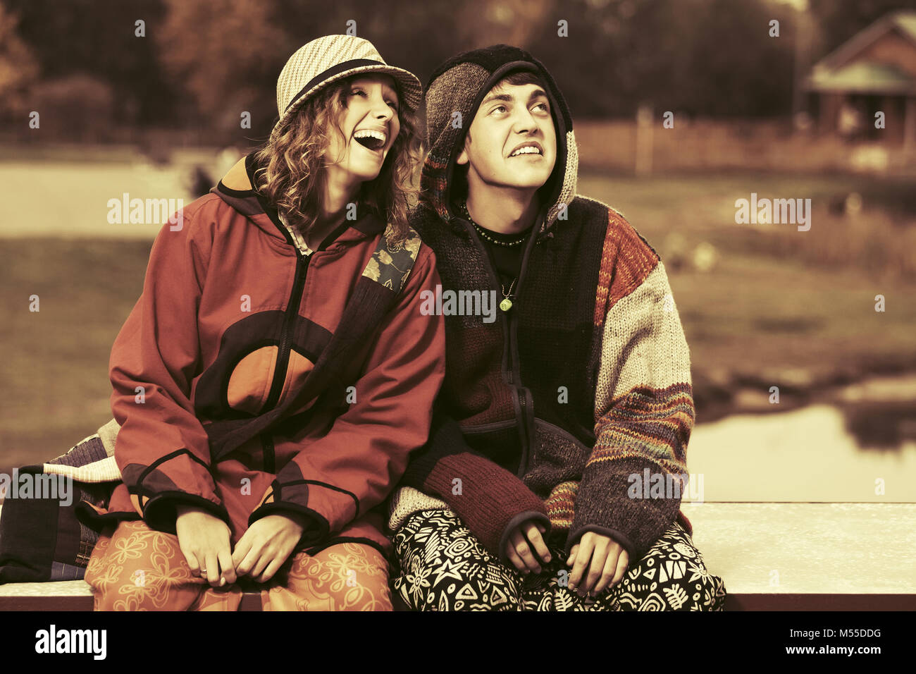 Happy young fashion hippie couple outdoor Stock Photo - Alamy