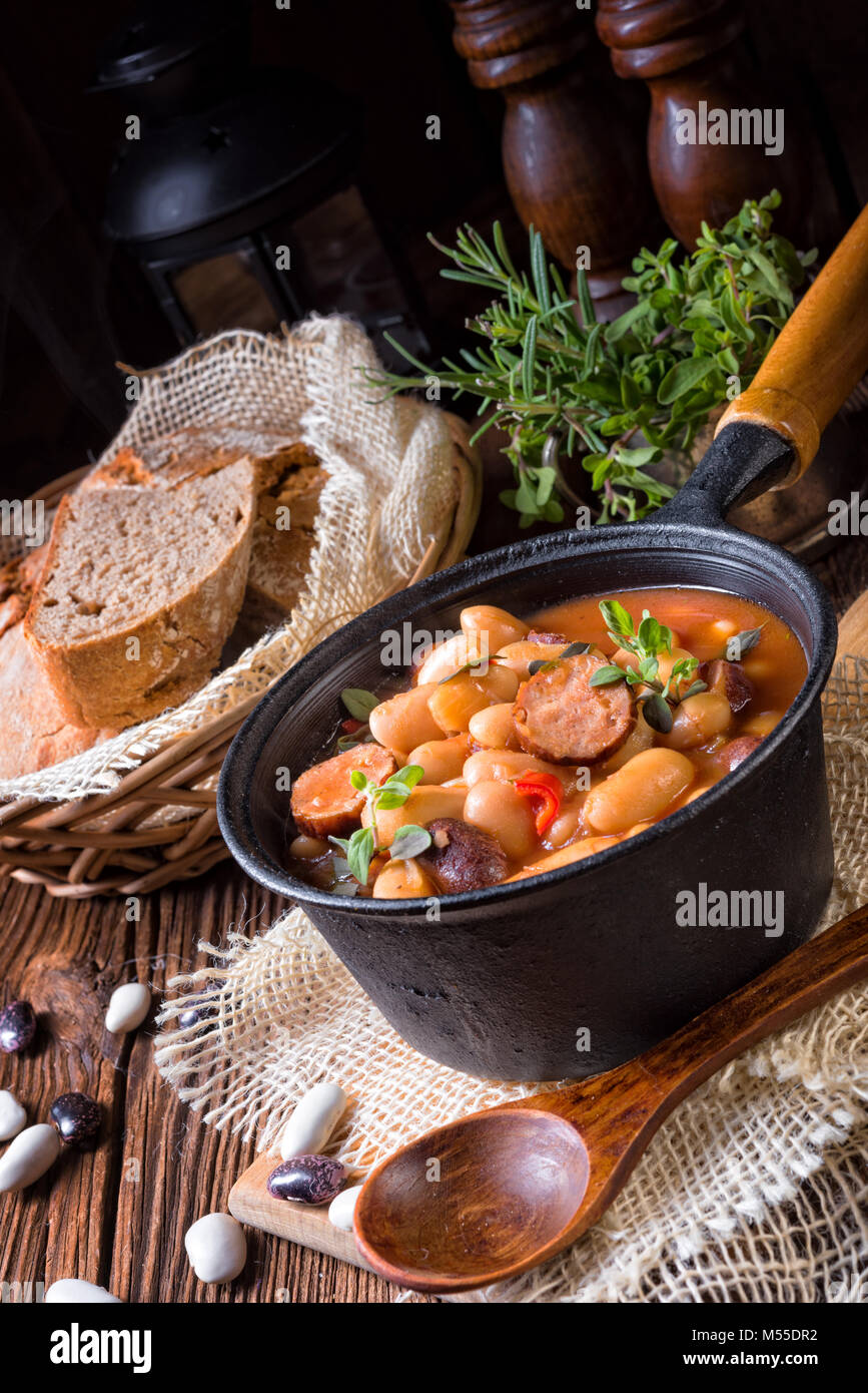 Polish Baked Beans with sausage Stock Photo Alamy