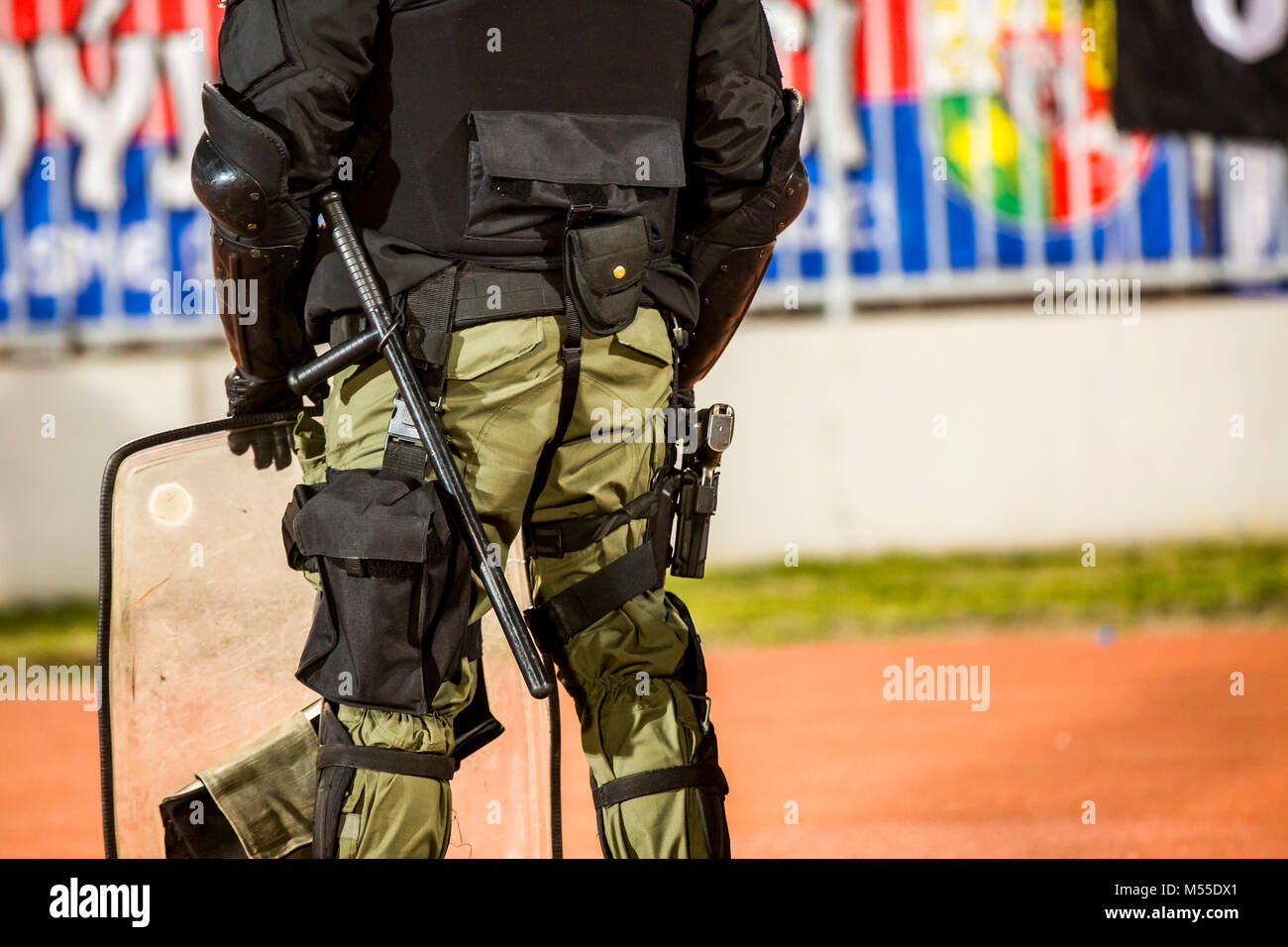 Special police unit at the stadium event secure a safe match against the hooligans Stock Photo