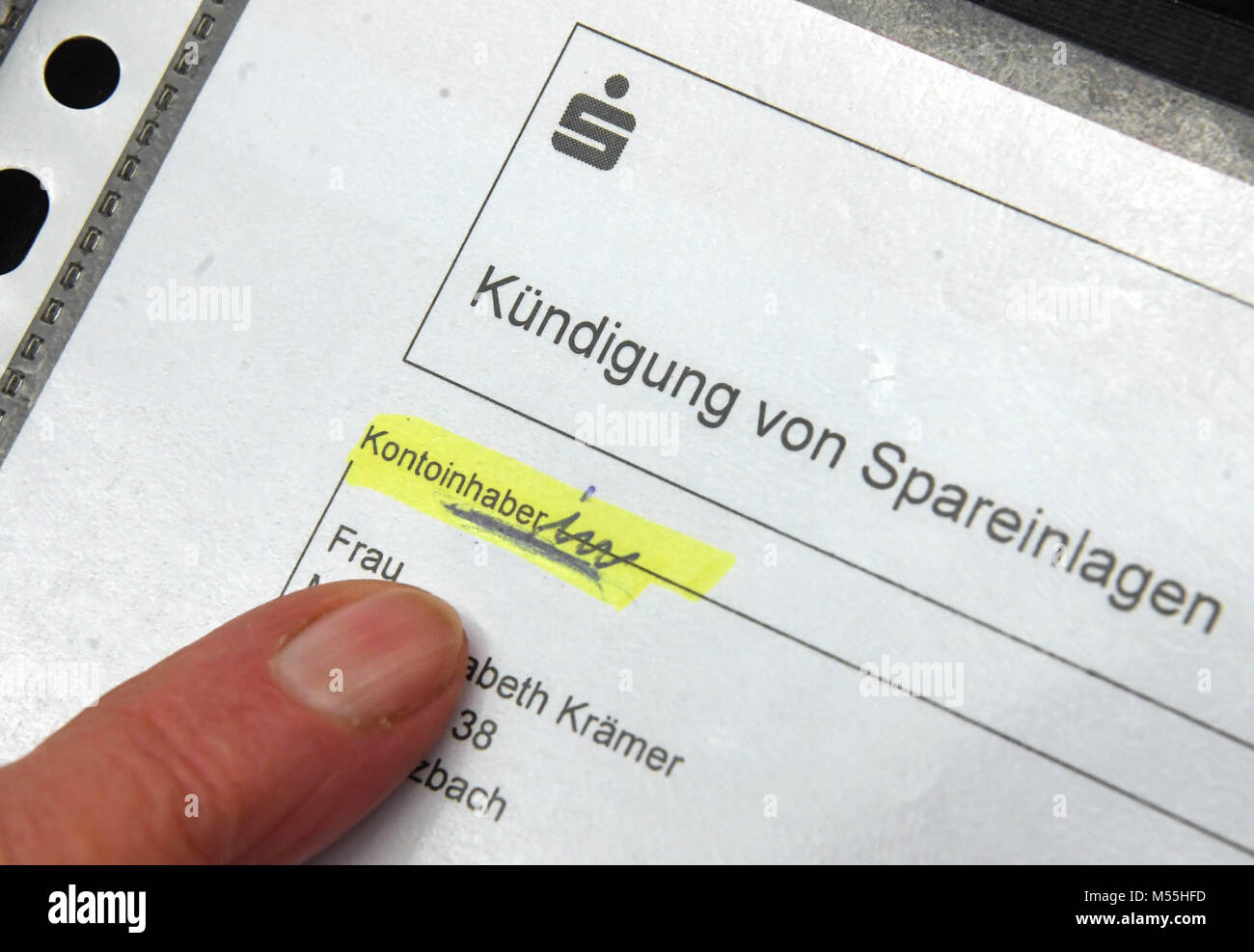 20 February 2018, Germany, Karlsruhe: Forms of a the Sparkasse with male address are shown during the trial at the Federal Supreme Court (BGH). A pensioner filed a lawsuit that Sparkasse is to name the female term of 'Kontoinhaber' (lit. account holder), being 'Kontoinhaberin' on their forms. Photo: Uli Deck/dpa Stock Photo