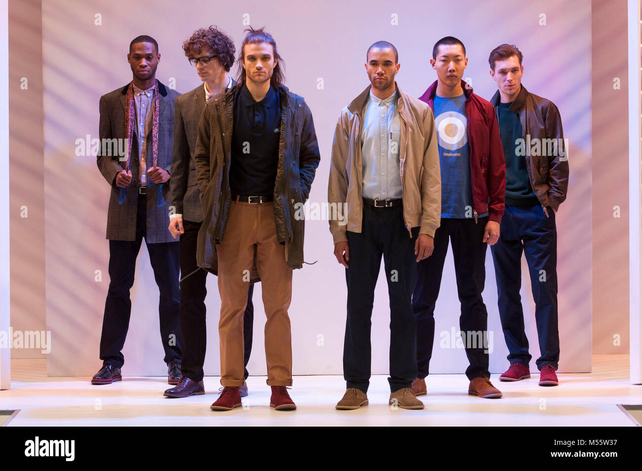 Male models on the menswear catwalk wearing designs by Lambretta at Moda.The trade fashion show ran 18th-20th February 2018 at the NEC, Birmingham, UK. Key trends highlighted for Autumn/Winter 2018 included red and burgundy, often in conjunction with black, and a major return for leopard print. Three separate catwalk shows, Moda Directions, Moda Gent, and Moda Woman, took place every day. Four halls of womenswear, accessories, menswear, and footwear kept fashion buyers from the UK and abroad busy choosing their ranges for later in the year.  Credit: Antony Nettle/Alamy Live News Stock Photo