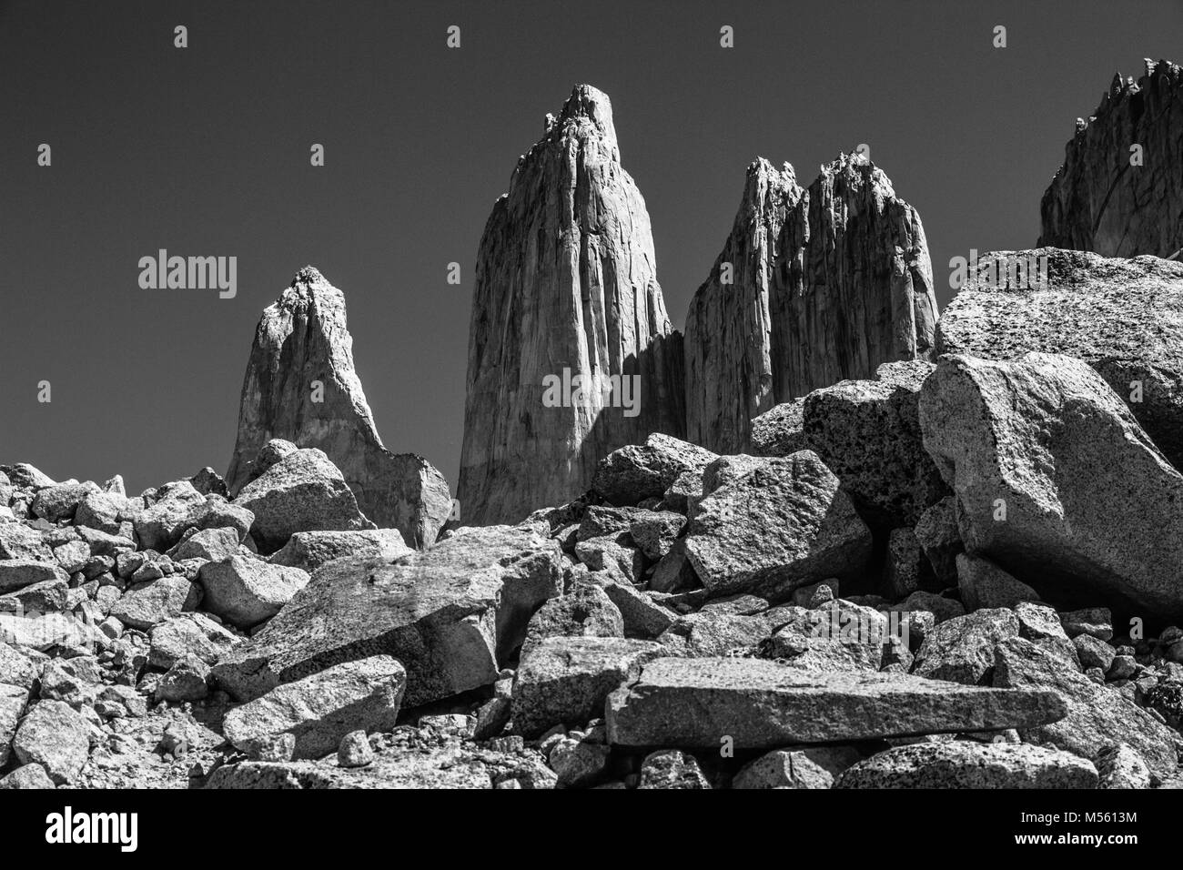 A black and white photo of the famous three granite towers of Torres del Paine National Park, the view at the end of the w walk. Stock Photo