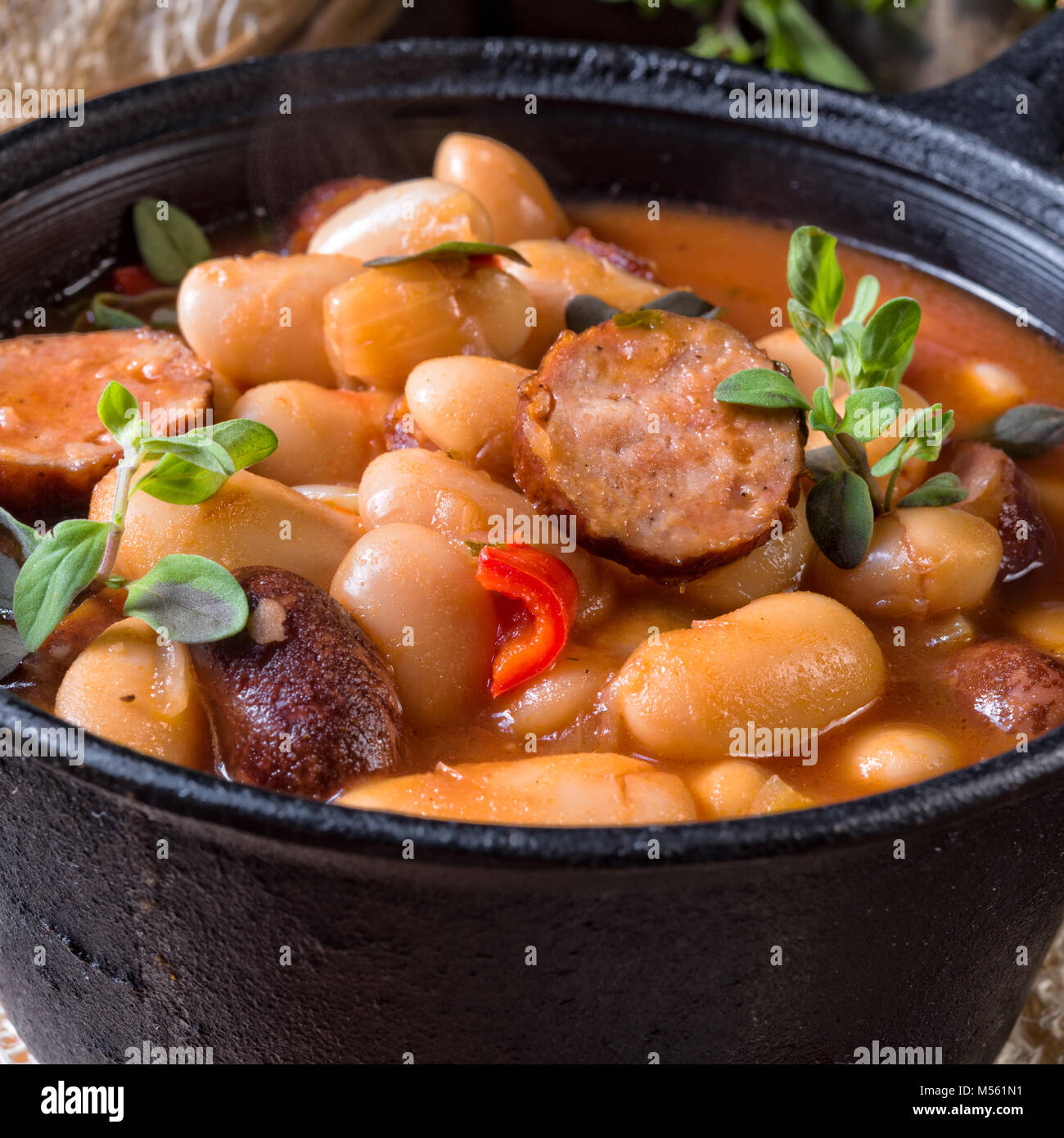Polish Baked Beans with sausage Stock Photo Alamy