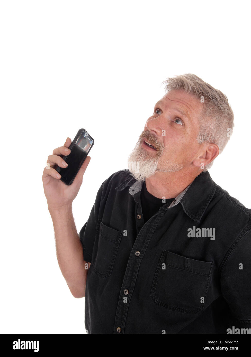 Middle age man frustrated with his phone Stock Photo