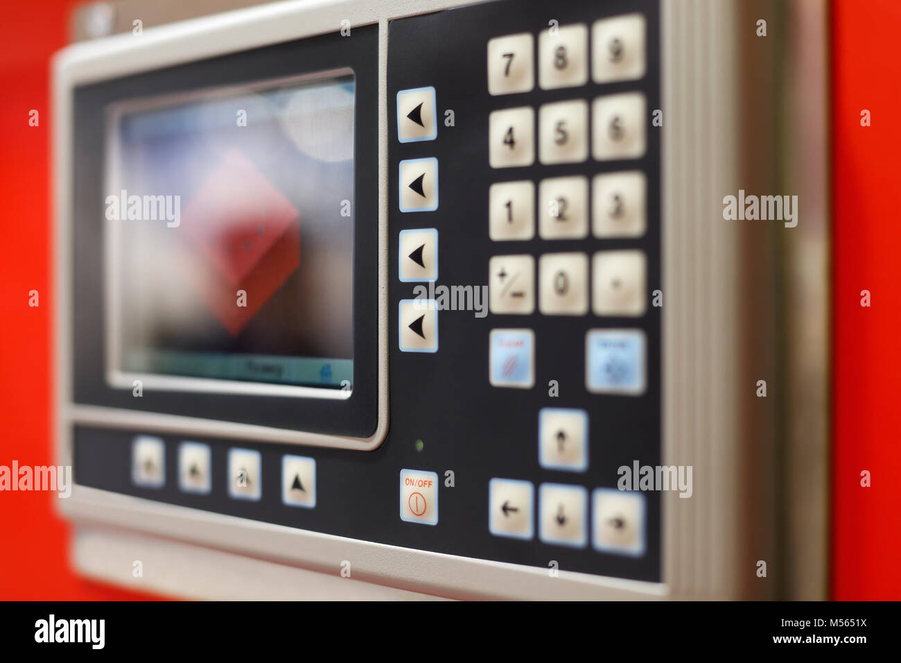 Control panel of the computer-aided manufacturing equipment. Selective focus. Stock Photo
