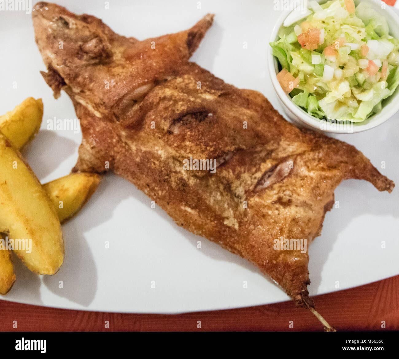 Fried guinea pig Stock Photo Alamy