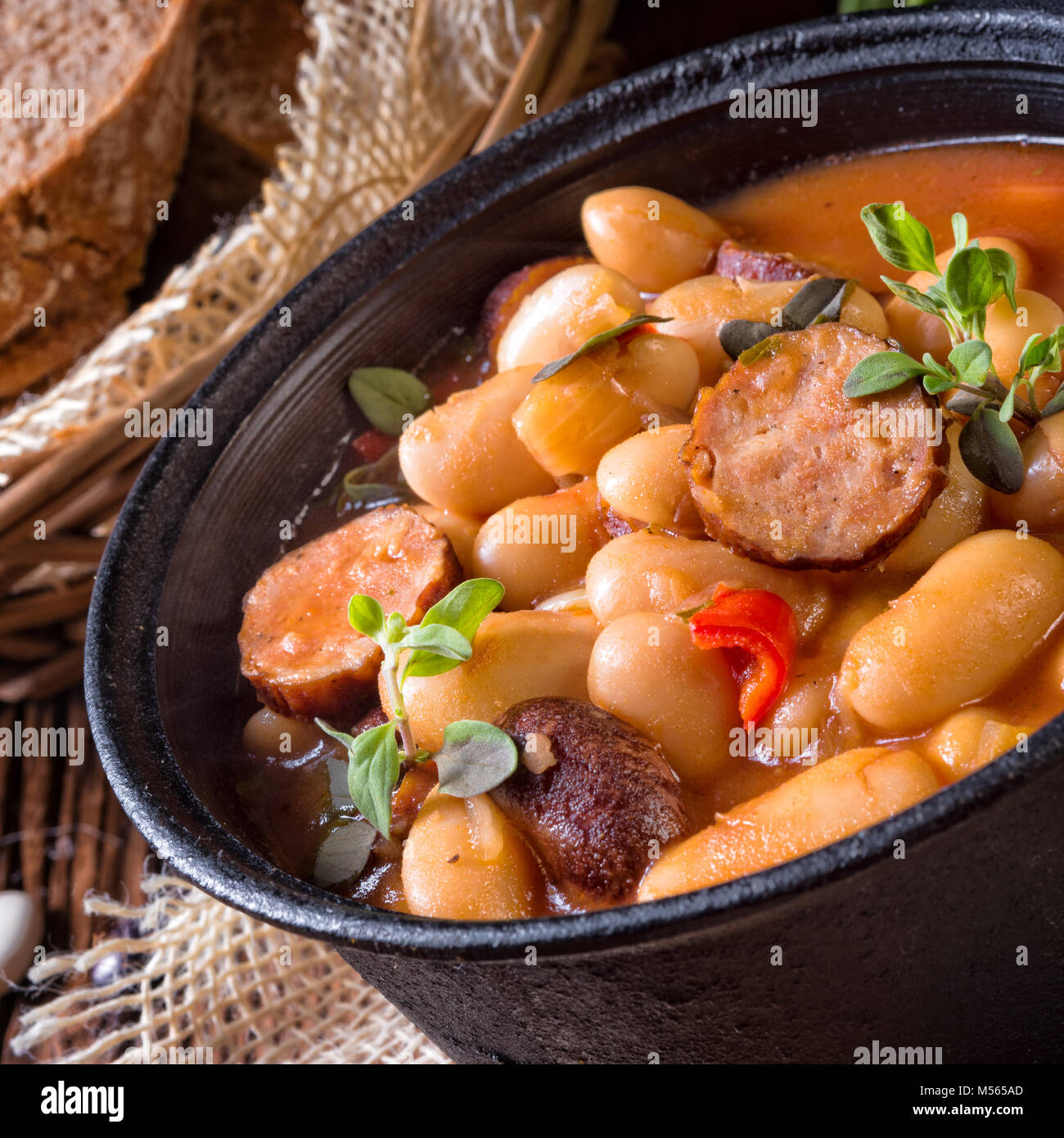 Polish Baked Beans with sausage Stock Photo Alamy