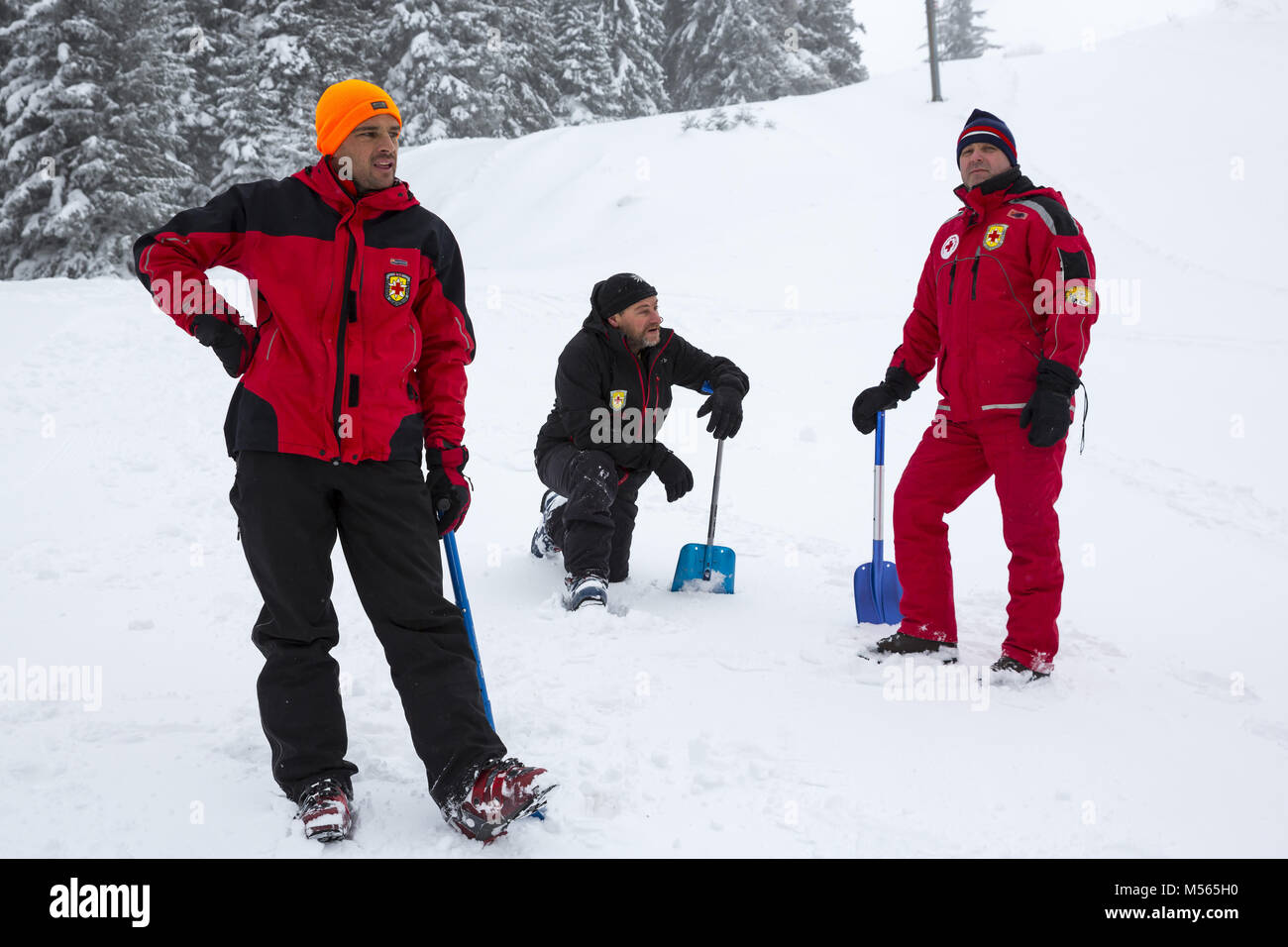 Red cross rescuers shovels hi-res stock photography and images - Alamy