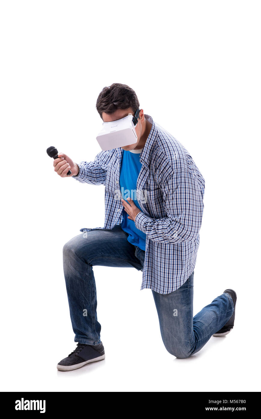 Young man wearing virtual reality VR glasses Stock Photo - Alamy