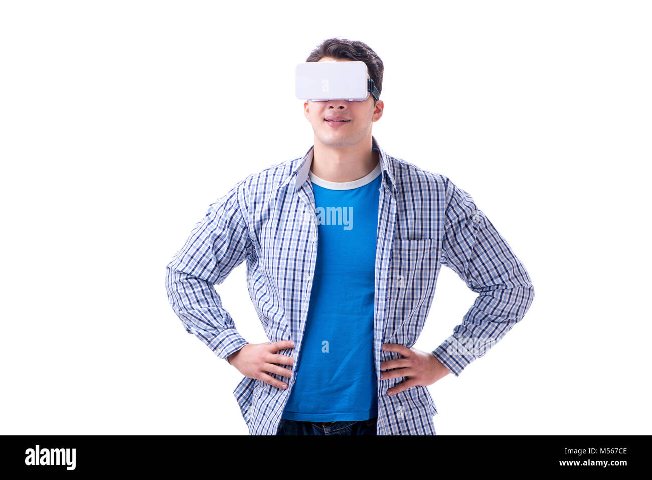 Young man wearing virtual reality VR glasses Stock Photo - Alamy