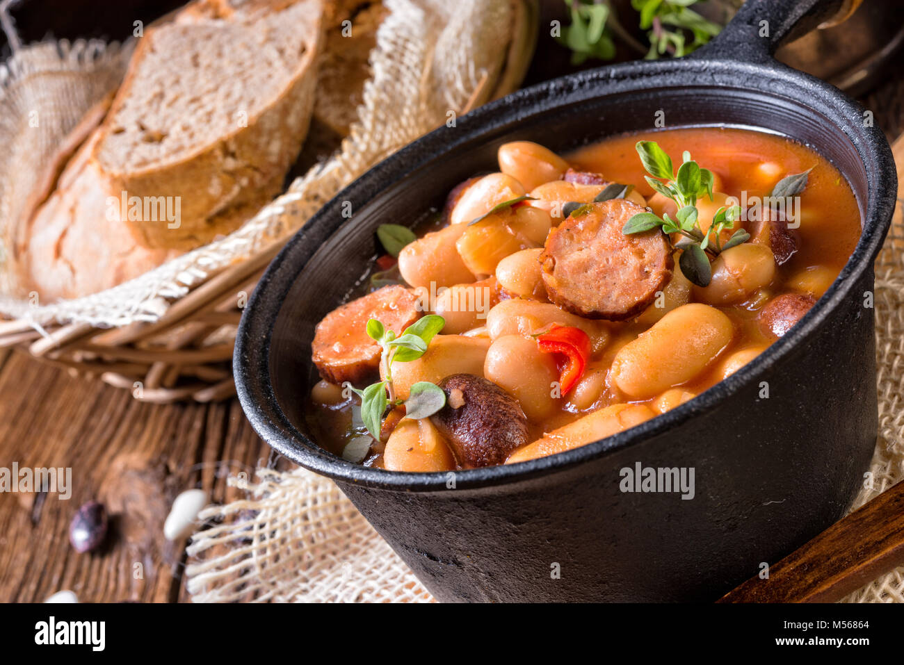 Polish Baked Beans with sausage Stock Photo Alamy