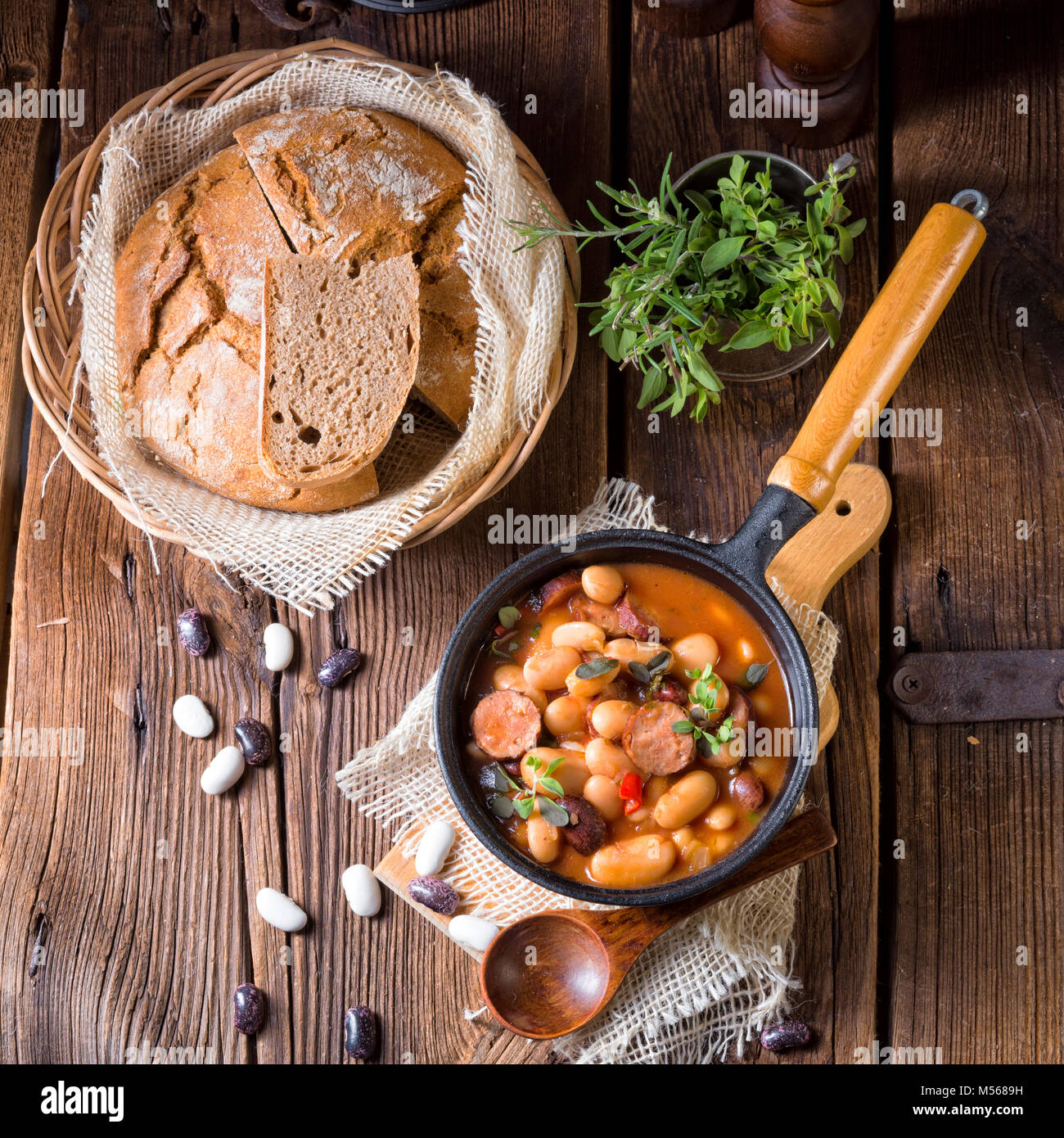 Polish Baked Beans with sausage Stock Photo Alamy
