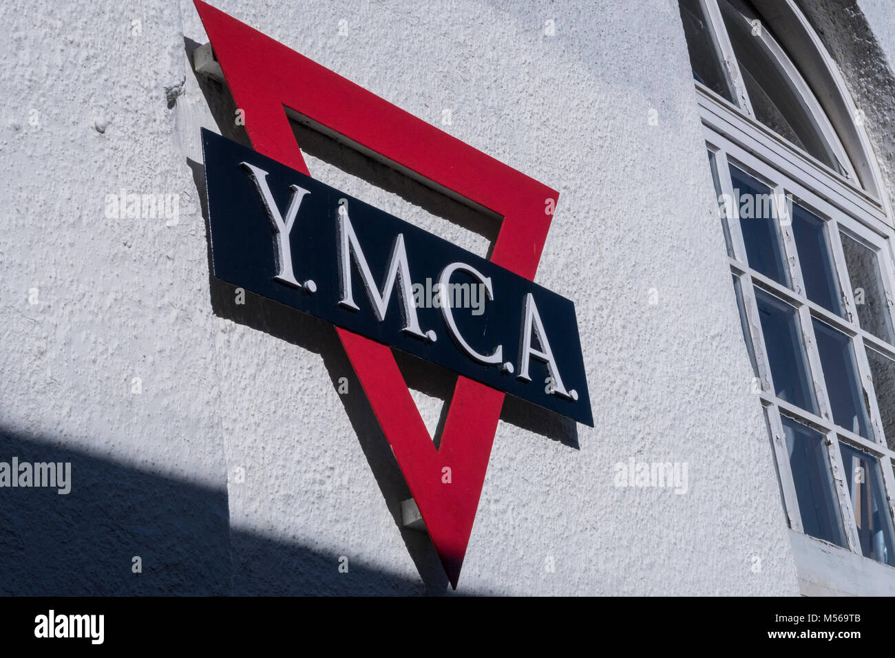 YMCA sign on a wall in Sidmouth, Devon. Stock Photo