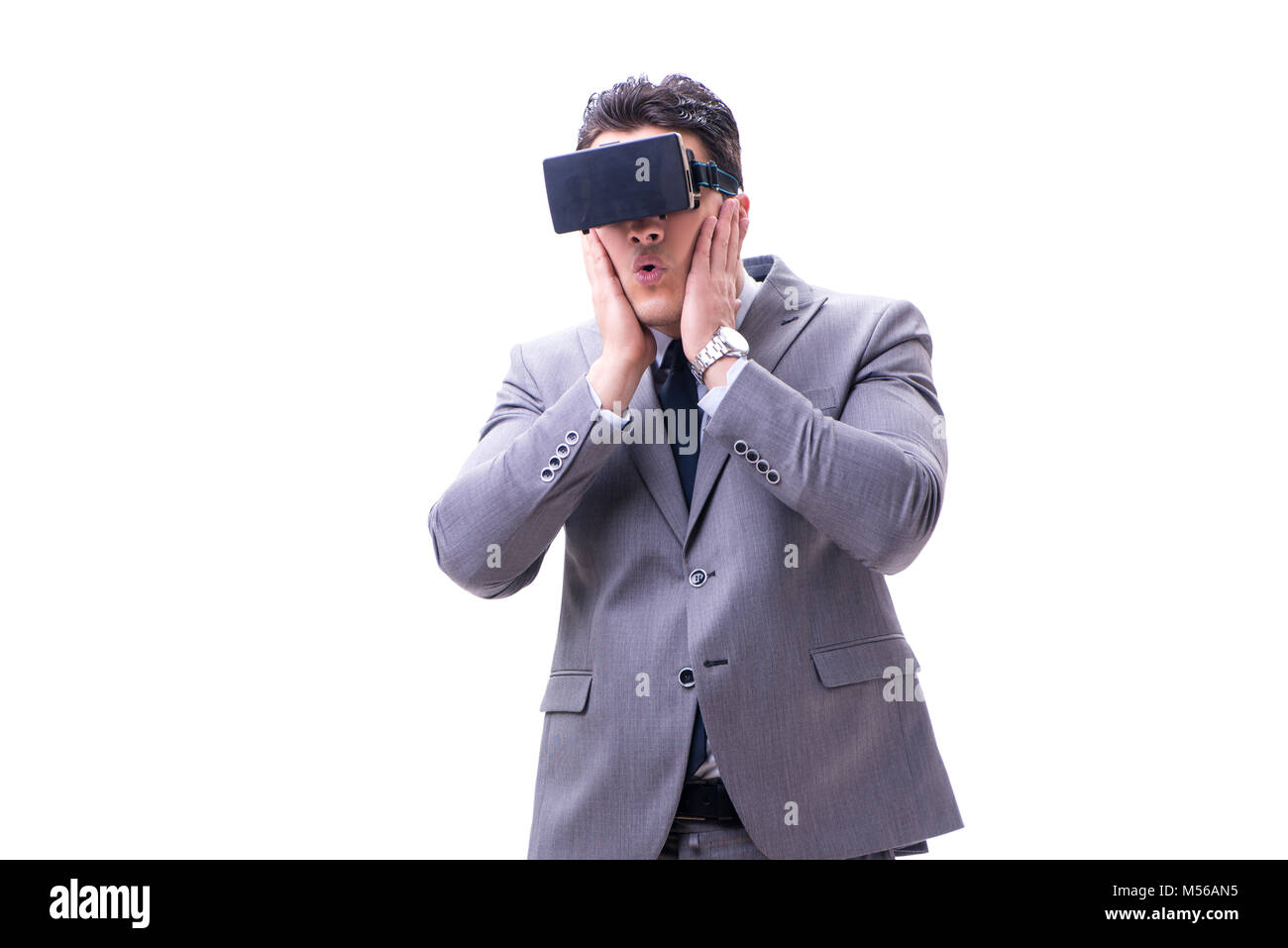 Businessman wearing virtual reality VR glasses isolated on white Stock ...