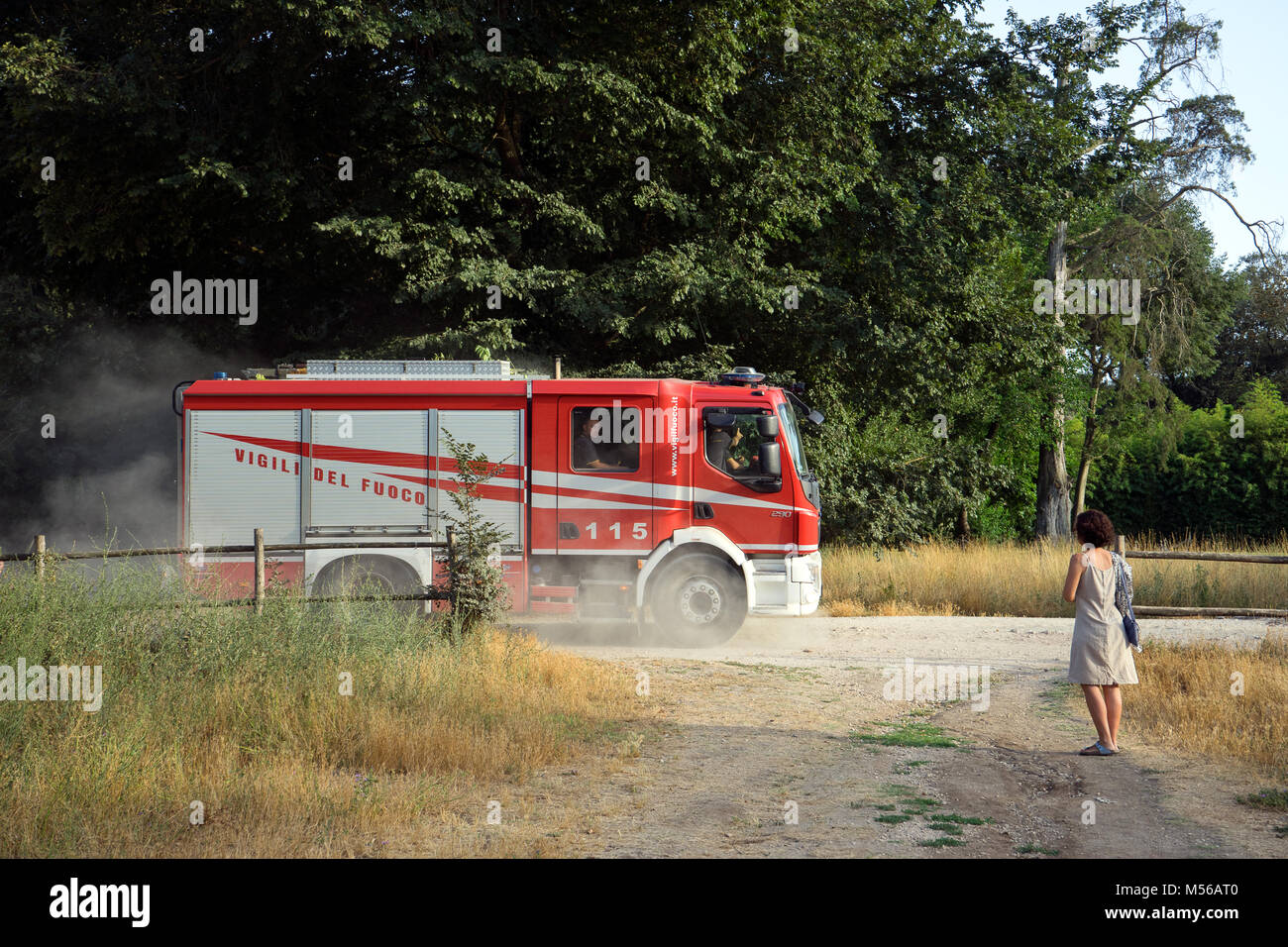 Rome, Italy: a Rome fire fighters truck runs along the dirt roads of Villa Ada in Rome after a call to 115 for a suspected outbreak of fire. Stock Photo